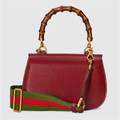 borsa gucci bamboo pelle e tessuto|Tutto sulla borsa Bamboo di Gucci .